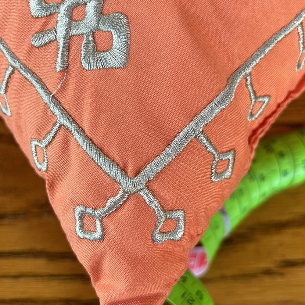 Jessica Simpson accent pillow.  Orange w/tan embroidery on one side.  12”x16.5”